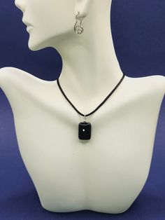 Discover the perfect blend of style and protection with our stunning obsidian collection. Start with an obsidian necklace, featuring the deep, mysterious allure of this powerful stone. Embrace the nostalgic vibe of a Y2K necklace, designed to make a bold statement. Our unisex obsidian jewelry pieces are versatile and stylish, suitable for any gender. Enhance your protection with a unique protection amulet or the elegant protection necklace. Pair these with a sleek black string necklace, offering Black Amulet Jewelry For Meditation, Elegant Obsidian Jewelry For Healing, Black Minimalist Necklace With Large Pendant, Minimalist Black Necklace With Large Pendant, Modern Black Necklace With Large Pendant, Black Obsidian Amulet Necklaces, Black Obsidian Necklaces For Meditation, Black Rectangular Spiritual Jewelry, Black Obsidian Amulet Necklace