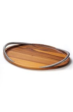 a wooden tray with metal handles