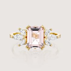 Guaranteed to take your breathe away, the 1.50CT morganite stone at the core of the Daphne is serene. The morganite is adorned with 6 dazzling marquise diamonds, contributing extra glamour to the ring. The elegance of this piece is incomparable as it radiates royalty and allure. Due to the nature of the stone the color of the morganite may vary. All features can be customized! Please contact us if you wish to make changes, we love making custom designs. All of our jewelry is carefully handmade i Rose Gold Topaz Ring With Morganite And Accent Stones, Blush Morganite Ring With Center Stone, Morganite Diamond Ring With Brilliant Cut, Blush Morganite Ring With Prong Setting, Blush Morganite Rings With Prong Setting, Morganite Diamond Ring With Accent Stones, Yellow Gold Morganite Jewelry With Center Stone, Blush Diamond Ring With Center Stone, Morganite Rings With Accent Stones