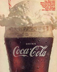 an advertisement for coca - cola with a glass full of ice and whipped cream on top