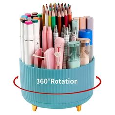 a blue container filled with lots of different colored pencils