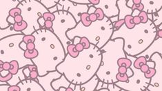 the hello kitty wallpaper is pink and has gold dots