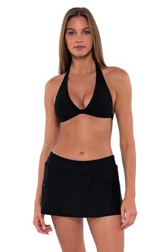 The Sporty Swim Skirt will become one of the most versatile pieces in your swimwear collection. This skirt is ideal for women who want more coverage along with functionality. Featuring hidden attached shorts and a wide waistband, it will keep you comfortable on those busy summer days. Also includes a side zipper pocket and a mid-rise fit. Mid-Rise Full Coverage Zipper Pocket Hidden Attached Swim Short No Pinch Waist Top Sold Separately Solid Swim Skirt With Built-in Bra For Pool, Black Summer Swim Skirt With Built-in Shorts, Black Swim Skirt With Built-in Shorts For Vacation, Stretch Swim Dress With Built-in Shorts For Beach, Solid Color Swim Dress With Built-in Shorts, Versatile Solid Color Swimwear For Beach, Beach Swim Dress With Built-in Shorts, Versatile Swimwear For Beach, Summer Black Swim Skirt With Built-in Shorts