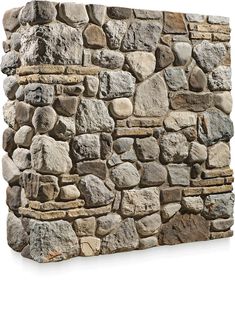 a stone wall is shown with no people in the photo, and it appears to be made out of rocks