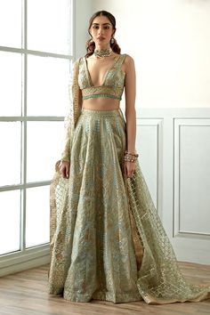 Sky blue lehenga with all over floral pattern work. Comes with embroidered blouse and dupatta.
Components: 3
Pattern: Embroidery
Type Of Work: Sequins
Neckline: Plunge V
Sleeve Type: Sleeveless
Fabric: Organza, Dupatta: Net
Color: Blue
Other Details: 
Tassel hem blouse
Scallop embroidered dupatta
Occasion: Bride,Wedding - Aza Fashions Sky Blue Lehenga, Studio Iris, Sequence Lehenga, Indian Bridesmaid Dresses, Simple Lehenga, Indian Outfits Lehenga, Lehenga Designs Simple, Blue Lehenga, Traditional Indian Outfits