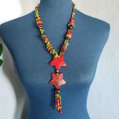 Beautiful Multi Color Wood Bead Necklace With Fish Hook Yellow Heart Earrings Measures 22" In Length With 6" Star Tassel New Handmade Multicolor Casual Necklaces, Colorful Handmade Casual Necklace, Casual Multicolor Necklaces For Gifts, Casual Colorful Handmade Necklaces, Casual Colorful Handmade Necklace, Casual Multicolor Beaded Necklace For Gift, Casual Red Beaded Chain Jewelry, Casual Colorful Necklace For Gifts, Bohemian Rainbow Beaded Necklaces With Wooden Beads