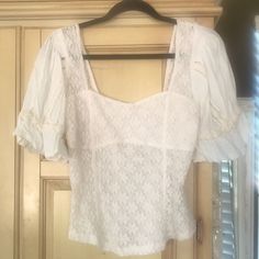 New Without Tags Beautiful Comfortable Free People Top. The Bra Part Is Doubled So It’s Not See-Through Where It Shouldn’t Be. This Can Be Machine Washed. I Would Say It Will Fit A Medium And A Large. Summer Lace Tops With Puff Sleeves, Summer Lace Top With Square Neck, Fitted Square Neck Cottagecore Top, White Fitted Cottagecore Top, Fitted Lace Top For Summer Daywear, Free People Top, Free People Tops, Free People, Womens Tops