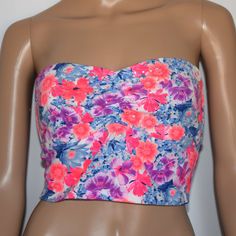 94% Cotton/6% Elastane, Hand Wash Cold. Pink Strapless Top With Built-in Bra, Strapless Pink Top With Built-in Bra, Trendy Fitted Pink Tube Top, Fitted Bandeau Top With Floral Print, Fitted Floral Print Bandeau Top, Pink Crop Top With Built-in Bra For Vacation, Spring Bandeau Crop Top With Built-in Bra, Multicolor Strapless Floral Print Tube Top, Floral Print Fitted Tube Top For Vacation