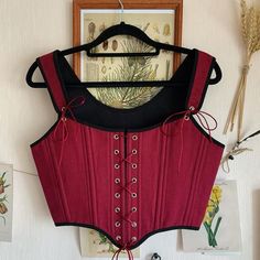 Reversible linen overbust corset, black & burgundy renaissance corset, Cosplay costume, victorian stays, 18th Century Inspired Corset Transform your wardrobe with this stunning reversible corset ♡ Adorned in burgundy linen and classic black linen on the other, this versatile piece offers double the style in one chic design. Featuring back lacing this corset ensures a perfect fit while adding an elegant touch to any ensemble.  ♡ Features♡ An accessory that evokes feelings of femininity, slenderne Medieval Style Fitted Corset Belt With Corset Back, Medieval Underbust Corset Dress With Boned Bodice, Black Fitted Medieval Corset Belt, Black Medieval Underbust Corset Belt, Fitted Medieval Corset Belt For Halloween, Medieval Underbust Corset For Halloween, Medieval Style Fitted Corset For Halloween, Medieval Fitted Corset For Halloween, Gothic Corset Belt With Boned Bodice For Larp