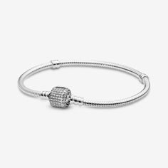 The classic Pandora charm bracelet is given a glamorous upgrade with this sparkling pavé version. Crafted from sterling silver, this sleek snake chain bracelet features a barrel clasp set with sparkling cubic zirconia stones. Wear it solo or as a sophisticated carrier for your personal collection of Moments clips and charms. - Pandora Moments Sparkling Pavé Clasp Snake Chain Bracelet - Sterling silver / Cubic Zirconia / Clear - Sz. 7.1 in Charms Pandora, Snake Chain Bracelets, Mesh Bracelet, Pandora Charm, Dangle Charms, Bracelets And Charms, Snake Chain, Pandora Charms, Sterling Silver Bracelets