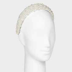 Whether you're attending a wedding, a soirée, or a glamorous night out, the White Pearl Headband effortlessly complements a myriad of styles. Its versatility knows no bounds – pair it with a flowing evening gown for a regal look or use it to add a touch of sophistication to your casual attire. Elegant Fitted Headpieces For Holiday, Elegant Silver Beaded Headpiece, Elegant Fitted Holiday Headpieces, Glamorous Adjustable Party Headpieces, Pearl White Bridal Accessories For Party, Elegant Adjustable Hair Accessories For Formal Events, Elegant Silver Bridal Headband, Elegant Cream Bridal Accessories, Elegant Summer Bridal Accessories