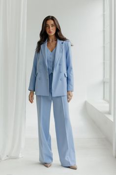 Sky Blue 3-piece suit. Wedding guest pantsuit.Matching set blazer vest and pants.Light  Blue palazzo pants suit.Bridesmaids pants suit. Material: 80% cotton 20% viscose Colors: Sky Blue Other Colors: Black, White, Red, Hot Pink, Dark Blue, Jeans, Mocha, Beige, Kelly Green, Sky Blue https://www.etsy.com/shop/UndineMuse?ref=seller-platform-mcnav&section_id=46830748 Sizes-Length: XS size: Blazer-70cm (27,5''), Sleeves-59cm (23,2''), Pants-107cm (42,1'') S size: Blazer-71cm (27,9''), Sleeves-60cm (2 Blue Women’s Suit, Light Blue Suits Women, Elegant Tailored Wide-leg Pants Sets, Chic Wide-leg Pants Suits For Office, Spring Tuxedo Style Tailored Pantsuit, Light Blue Notch Lapel Suits For Work, Tailored Three-piece Suit For Spring With Long Sleeves, Tailored Tuxedo Style Pantsuit For Spring, Tailored Tuxedo-style Pantsuit For Spring