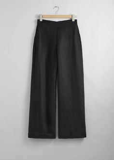 Relaxed high-waist trousers cut from a breezy material. Finished with a clean waistline.• Duo welt pockets• Zipper at the back• Length of inseam:80cm / 31.5" (EU 36 / UK 8 / US 4) Chic Bottoms With Wide Waistband For Work, Chic Workwear Bottoms With Wide Waistband, Chic Linen Bottoms With Welt Pockets, Versatile High Waist Linen Bottoms, Wide Leg Bottoms With Wide Waistband For Work, Chic Wide-leg Pants With Wide Waistband, Chic Linen Bottoms For Work, Chic Linen Bottoms For Business Casual, High-waisted Linen Pants For Business Casual