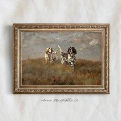 a painting of two dogs running in a field