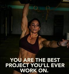 a woman lifting a barbell with the words you are the best project you'll ever work on