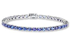 Adorn your wrist with the captivating beauty of our Natural Tanzanite Tennis Bracelet in Sterling Silver. Featuring a row of exquisite tanzanite gemstones set in polished sterling silver, this bracelet adds a touch of elegance and sophistication to any ensemble. Timeless Silver Tanzanite Jewelry, Silver Tanzanite Bracelet In Fine Jewelry Style, Silver Tanzanite Bracelet Fine Jewelry, Silver Tanzanite Bracelets For Formal Occasions, Fine Jewelry Tanzanite Bracelets For Gift, Elegant Silver Tanzanite Bracelets, Formal Tanzanite Bracelets Fine Jewelry, Elegant Tanzanite Bracelets For Formal Occasions, Formal Tanzanite Fine Jewelry Bracelets