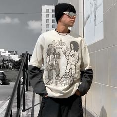 Our Casual Street Print Sweatshirt is perfect for those wanting to elevate their everyday wardrobe. Its timeless street print design and cotton blend fabric make this luxurious sweatshirt both comfortable and stylish. Crafted with attention to detail, this piece will bring a touch of sophistication to your off-duty wardrobe. Features: -100% Cotton -Crew neckline -Print design -Ribbed cuffs and hem -Unisex street style Cotton T-shirt With Ribbed Cuffs For Streetwear, Winter Streetwear Sweatshirt With Graffiti Print, Spring Streetwear Crew T-shirt, Urban Style Graffiti Print Sweatshirt For Winter, Urban Winter Sweatshirt With Graffiti Print, Winter Urban Sweatshirt With Graffiti Print, Casual T-shirt With Graffiti Print For Fall, Oversized Long Sleeve Graphic Sweater, Oversized Graffiti Print Sweatshirt For Winter