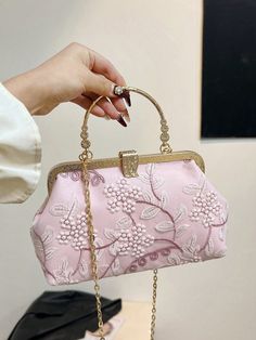 Elevate your style with our Chic Pink Lace Embroidery Shoulder Bag. Perfect for parties, weddings, and special occasions, this bag adds a touch of elegance to any outfit. The intricate lace embroidery and versatile shoulder strap make it both fashionable and functional. Get ready to turn heads with this must-have accessory. Color : Pink Bag Size : Small Pattern Type : Plants Type : Kiss Lock Bag Composition : 100% Polyester Material : Polyester Bag Height Bag Length Bag Width 15 23 8 Pink Embroidered Clutch Bag, Pink Floral Embroidered Clutch Bag, Pink Floral Embroidery Evening Bag, Elegant Embroidered Rectangular Bags, Pink Embroidered Rectangular Evening Bag, Elegant Embroidered Handheld Shoulder Bag, Elegant Embroidered Handheld Bag, Elegant Handheld Embroidered Shoulder Bag, Elegant Handheld Embroidered Bag