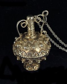 "Vintage Sterling Silver Danecraft Ornate Middle Eastern Urn Pendant Necklace Item being offered is a beautiful and unique vintage sterling silver Danecraft ornate Middle Eastern urn pendant necklace. The pendant hangs on a sterling cable chain. The closure on the chain is a springring closure. The bottom of the pendant is marked \"Sterling R Danecraft\". The chain is marked 925. Measurements Necklace Length: 18\" inches Pendant Height: 1.25\" inches Pendant Width: .85\" inches Weight: 11.8 g Co Bali Jewelry, Thick Chain Necklace, Urn Pendant, Silver Jewelry Necklace, Gold Wash, Middle Eastern, Necklace Length, Cable Chain, Vintage Sterling Silver