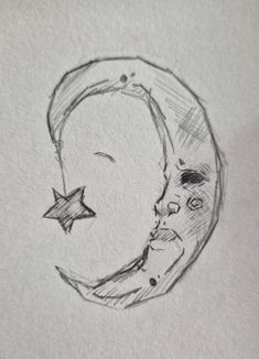 a drawing of a crescent moon with a star on it's side and a face in the middle