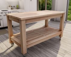 a kitchen island on wheels in the middle of a wooden flooring area with sliding glass doors