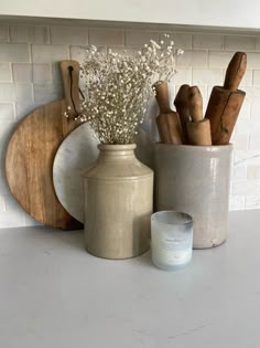 the kitchen counter is clean and ready to be used as a centerpiece for cooking utensils