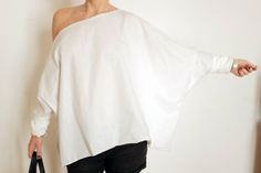 Asymmetrical Top Off Shoulder Tunic Plus Size by atelierPop Oversized Off-shoulder Summer Tops, Oversized Off-shoulder Tops For Summer, Oversized Off-shoulder Cotton Top, Elegant Oversized Top For Day Out, White One-shoulder Blouse For Day Out, Casual White One-shoulder Blouse, White One Shoulder Blouse For Day Out, One Shoulder White Blouse For Day Out, Oversized Tunic Tops For Day Out