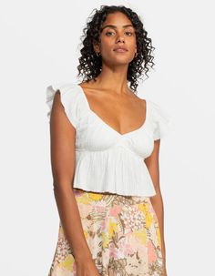 Roxy Brisa Flutter Sleeve Crop Top. Featuring A Peplum Hem To Flatter Your Shape, Roxy's Brisa Crop Top Is Made Of Breezy Cotton Gauze Fabric With A V-Neck And Flutter Sleeves For A Feminine Touch. Easy Fit. Pull On Closure. Beachy Raw Edge Detailing On Sleeves And Hem. Encased Elastic On Neckline. Under Bust For Easy Pull On Fit. 100% Cotton. Machine Wash. Imported. Beach Tops With Ruffles And Flutter Sleeves, Feminine Ruffled Tops For Vacation, Feminine Ruffle Sleeve Beach Tops, Feminine Flutter Sleeve Top For Vacation, Flirty Summer Top With Ruffle Sleeves, Flirty Summer Tops With Ruffle Sleeves, Beach Fitted Top With Ruffle Sleeves, Fitted Beach Top With Ruffle Sleeves, Fitted Flutter Sleeve Tops For Vacation