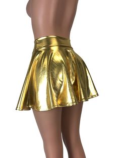 Gold Bottoms For Club And Summer, Gold Bottoms For Clubbing In Summer, Fitted Gold Skirt For Spring, Metallic Flared Skirt, Gold Lined Skirt For Night Out, Gold Fitted Bottoms For Club, Gold Fitted Bottoms For Club Wear, Fitted Gold Bottoms For Club Wear, Fitted Gold Mini Skirt For Spring