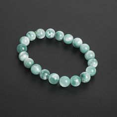 Quantity: 1 Strand approx.20 Beads Material: Genuine Natural Size: 9-10MM Drill Hole size: Approx. 0.8-1MM Condition: Brand new beads Shape: Round Item Type: Bracelet Weight: Approx. 23.9g Item number: 126896h-4154 More beads are available at: https://www.etsy.com/shop/JLDreamWorks?ref=hdr More quantity are available upon request. Images appear larger than actual size in order to depict clearly products details. Gift Box:  * If you would like to get the box color you want, please mark a note on checkout page, OR we will send the color randomly.  * Please DO NOT send through email, as sometimes we will notice the message after shipped out order.  While every effort is made to represent colors as accurately as possible, slight variations may occur due to differences in individual monitor's s Green Moonstone, Moonstone Beads, Beaded Material, Beads Bracelet, White Green, Moonstone, Accessory Gift, Beaded Bracelets, Gems