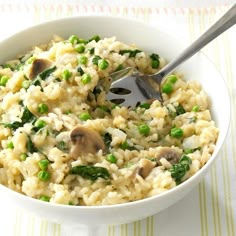 a white bowl filled with rice and peas