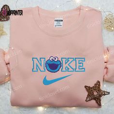 Introducing the Cookie Monster x Nike Embroidered Shirt, the perfect blend of childhood nostalgia and streetwear style. Crafted with precision, Monster Embroidery, The Cookie Monster, Custom Nike, Nike Shirt, Childhood Nostalgia, Exclusive Clothing, Anniversary Gifts For Husband, Hoodie Material, Custom Nikes