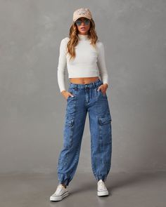 ● Fitted ● High rise ● Jogger silhouette with stretch waistband & elastic cuffs ● Cargo pockets & side slip pockets ● Contrast stitching ● Front zip fly & button closure ● 60% Cotton 40% Polyester ● Hand wash cold, lay flat to dry. Cargo Jeans Outfit Women, Cargo Jeans Outfit, Western Wear Dresses, Jeans Outfit Women, Denim Joggers, Dresses By Length, Wrap Sweater, Black Friday Shopping, Fall Shopping