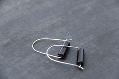 "ATTENTION I am going to be out of the studio EVERY WEEKEND from Friday to Monday. All orders placed Friday to Sunday are going to be processed and shipped following Tuesday and Wednesday, so please, plan accordingly. Less is more for these earrings! U-shape simple earrings hold black polished agate and securely close with hoop-like closure. Simple and elegant, great for everyday or as a subtle statement piece. Color combination is classical, gold or silver and black. it's timeless! You get to c Modern Black Handmade Hoop Earrings, Black Minimalist Sterling Silver Hoop Earrings, Modern Handmade Black Hoop Earrings, Black Sterling Silver Hoop Earrings For Everyday, Everyday Black Sterling Silver Hoop Earrings, Minimalist Handmade Black Hoop Earrings, Black Minimalist Handmade Hoop Earrings, Modern Black Hoop Earrings For Everyday, Black Minimalist Hoop Earrings For Gift