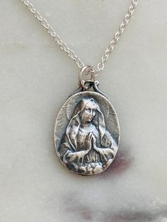 All Sterling Silver necklace. Elegant Miraculous Medal Necklace, Silver Necklace With Miraculous Medal For Jewelry Making, Miraculous Medal Pendant Necklace For Memorial, Miraculous Medal Pendant Necklace For Memorials, Nickel Free Spiritual Necklaces, Medallion Necklace For Memorial, Virgin Mary Pendant Necklace As Gift, Lady Of Lourdes, Our Lady Of Lourdes