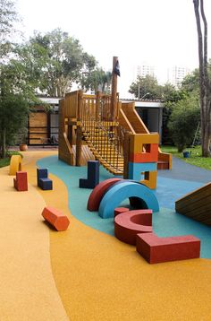 children's play area with slide and climbing equipment