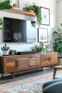 Mid Century Modern Living Room Tv Wall, Tv Cabinet With Floating Shelves, Walls In Living Room Decorating, Wall Shelves Under Tv, Living Room Wall With Tv Decor Ideas, Asymmetrical Tv Wall Decor, Floating Shelves Over Tv Living Rooms, Shelves And Art On Wall, Above Mounted Tv Decor