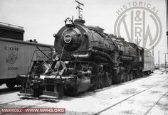 an old black and white photo of a train