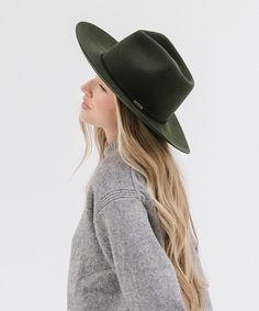 The Rowan is a fedora re-imagined. We've redesigned it with a taller crown + wider brim for a more dramatic take on a classic + timeless style. Featuring an attached genuine leather band, this hat is a statement piece on it's own. Classic Felt Hat For Fall, Classic Felt Hat For Everyday Fall Wear, Everyday Fall Fedora With Flat Brim, Chic Flat Crown Fedora For Fall, Modern Curved Brim Fedora For Fall, Fall Fedora With Flat Crown, Everyday Fedora With Flat Crown For Fall, Everyday Fall Fedora With Flat Crown, Modern Flat Brim Fedora For Fall