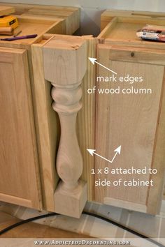 an unfinished cabinet door with measurements for the top and bottom section, labeled in white