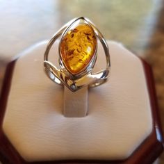 Gorgeous Honey Colored Natural Baltic Amber Ring! Stunning In Person! Set In 925 Stamped Sterling Silver. Brand New. Never Worn. Wholesale Prices Always....Or Less Can Be Resized If Needed By Any Professional Jewelry Repair Store! Classic Amber Ring Jewelry, Teardrop Bezel Set Jewelry, Classic Amber Jewelry For Anniversary, Classic Amber Sterling Silver Ring, Amber Sterling Silver Ring With Polished Finish, Amber Sterling Silver Jewelry For Anniversary, 14k White Gold Ring As A Gift, Classic Sterling Silver Teardrop Ring, Amber Ring With Accent Stones