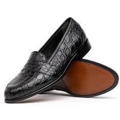 Tuscany is a timeless low vamp loafer with modern update. Crocodile from Italian tanneries is hand antiqued to bring our the rich texture of the crocodile leather and a full cushioned insole brings all day comfort. Hand antiqued crocodile leather Fully lined Poron cushioned insole Blake construction Two tone leather outsole Made in Italy Classic Dress Shoes With Crocodile Pattern For Business, Classic Crocodile Pattern Dress Shoes For Business, Business Crocodile Pattern Almond Toe Loafers, Classic Office Dress Shoes With Crocodile Pattern, Classic Black Oxfords With Crocodile Pattern, Classic Dress Shoes With Crocodile Pattern, Classic Crocodile Pattern Dress Shoes For Semi-formal, Classic Black Crocodile Pattern Loafers, Business Wingtip Loafers With Crocodile Pattern