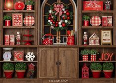 a wooden shelf filled with lots of christmas decorations