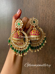 Our own designer pachi kundan unique chandbali designed by me in some different way  a chandbali with jhumka inside it with small ruby detailing. Glass beads hangings are added to just give wow look  Its  okay18 ct gold plated with silver and brass base. Totally handmade by our hardworking craftman converted my imagination into reality !!  Show some love order now . Note: if not available in stock made on order is possible need 20 -25 days Luxury Traditional Chandbalis With Cutdana, Luxury Chandbali Bridal Earrings With Tilla, Luxury Chandbali Jewelry With Gota Work, Luxury Chandbalis With Cutdana For Festive Occasions, Luxury Gold Plated Chandbalis With Meenakari, Bollywood Style Chandbalis With Gota Work For Designer Wear, Traditional Chandbali Jhumkas For Designer Wear, Bollywood Style Chandbali Earrings For Designer Wear, Designer Chandbali Jhumkas With Stone Work