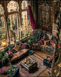 an elaborately decorated living room with blue couches