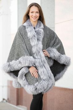 Indulge yourself in the luxury of our Cheri Peruvian Alpaca Cape, lavished in Canadian Silver Fox Fur Trim. Wool Shawl Outerwear For Winter, Luxury Wool Cape For Winter, Luxury Wool Winter Cape, Luxury Winter Poncho, Winter Poncho Cape For Cold Weather, Winter Wool Poncho For Cold Weather, Elegant Wool Capelet For Winter, Elegant Winter Cape Poncho, Luxury Cape With Faux Fur Trim