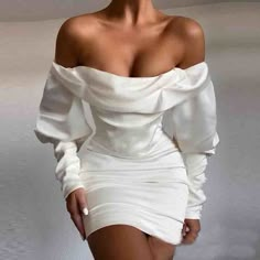 White One-Shoulder Long-Sleeved Dress sold by Fashionwomens101 on Storenvy White Off Shoulder Party Dress, White Long Puff Sleeve Dress, White Mini Dress Elegant, Satin White Mini Dress, Elegant White Mini Dress, White Dress Elegant Short, Long Sleeve Off Shoulder Dress For Night Out, Evening Off Shoulder Dress With Puff Sleeves, Puff Sleeve Off-shoulder Dress For Evening