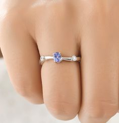 Natural Tanzanite Ring, Tanzanite Jewelry, Silver Ring, Boho Ring, Statement Ring, Gift for Her, Artisan Ring, Christmas Sale, Mom Gift Ring S T O N E ∙ D E T A I L S *Gemstone: tanzanite *Gemstone Type: Natural *Gemstone Shape: Oval (4*5) *Number of Gemstones: 1 *Gemstone Weight:0.42 Cts *Gemstone Grade: AAA *Accent Stones: Cubic Zirconia M E T A L ∙ D E T A I L S  *Metal Color: Rose Gold, Yellow Gold, White Gold *Metal: 925 Silver, 10k, 14k, 18k *Ring Size measure: Sizeable 4-14 US  *Setting: Tanzanite Birthstone Rings For Gifts, Tanzanite Birthstone Ring As A Gift, Fine Jewelry Tanzanite Ring For Gift, Tanzanite Round Rings As Gift, Tanzanite Round Ring As A Gift, Round Tanzanite Rings For Gifts, Tanzanite Solitaire Ring Gift, Tanzanite Ring With Round Band For Gift, Solitaire Tanzanite Ring Gift