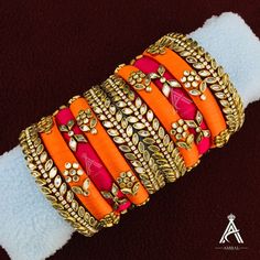 Our Hand-Finished thread work jewellery is quite soft in nature and feel exotic to wear which match for your all special occasions and for casual usage.The jewellery is made by a well trained Workers to give a perfect finishing and to fulfill our customers expectation. Shipping:     Product will be shipped through Postal Service & Delivery may take 10-15 Days.     Contact Seller For Faster Delivery (Extra Shipping Charge may Applicable). Care & Disclaimer:     Keep away from perfumes & water to Kundan Bangles, Silk Thread Jewelry, Silk Thread Bangles, Thread Bangles, Thread Jewellery, Handmade Bangles, Wings Design, Elegant Logo, Work Jewelry