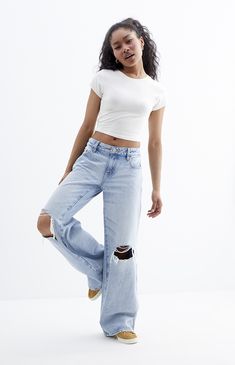 PacSun denim is back with a classic this season — the Casey Light Indigo Ripped Low Rise Baggy Jeans! These super cute Y2K-inspired jeans sit low on the waist and feature an ultra-slouchy relaxed leg, a light blue wash, and ripped details at the knees for some added edge. They're made with sustainably sourced cotton for an eco-friendly update.


	Model is wearing a size 26
	Model measurements: 5’7.5” height, 30.5” bust, 23.5” waist, 36” hips


Learn more about PacSun eco items Casual Everyday Distressed Flare Jeans, Casual Distressed Flare Jeans, Casual High Rise Distressed Jeans, Casual Flare Jeans For Spring Day Out, Casual Distressed Medium Wash Flare Jeans, Fitted Cutoff Casual Jeans, Casual Fitted Cutoff Jeans, Casual Ripped Flare Jeans For Spring, Spring Casual Ripped Flare Jeans